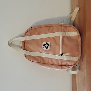 Arrow pack in peach, used in great condition, with minor signs of wear